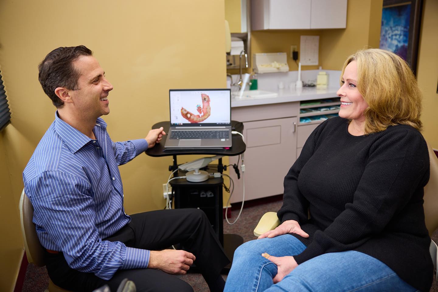 Dr. Conkle discussing treatment options with a patient