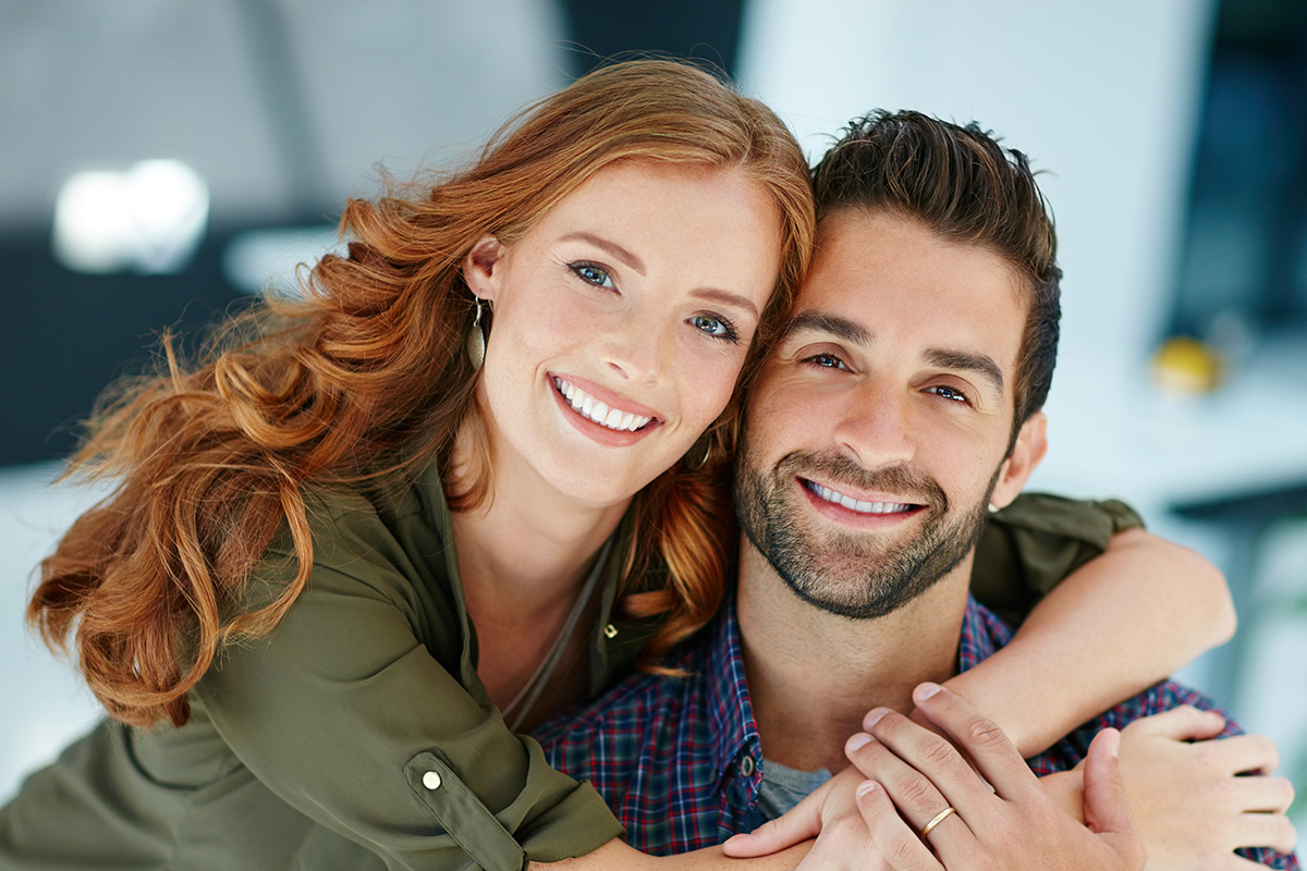 couple-together-smiling Results of cosmetic dentistry in Laguna Hills