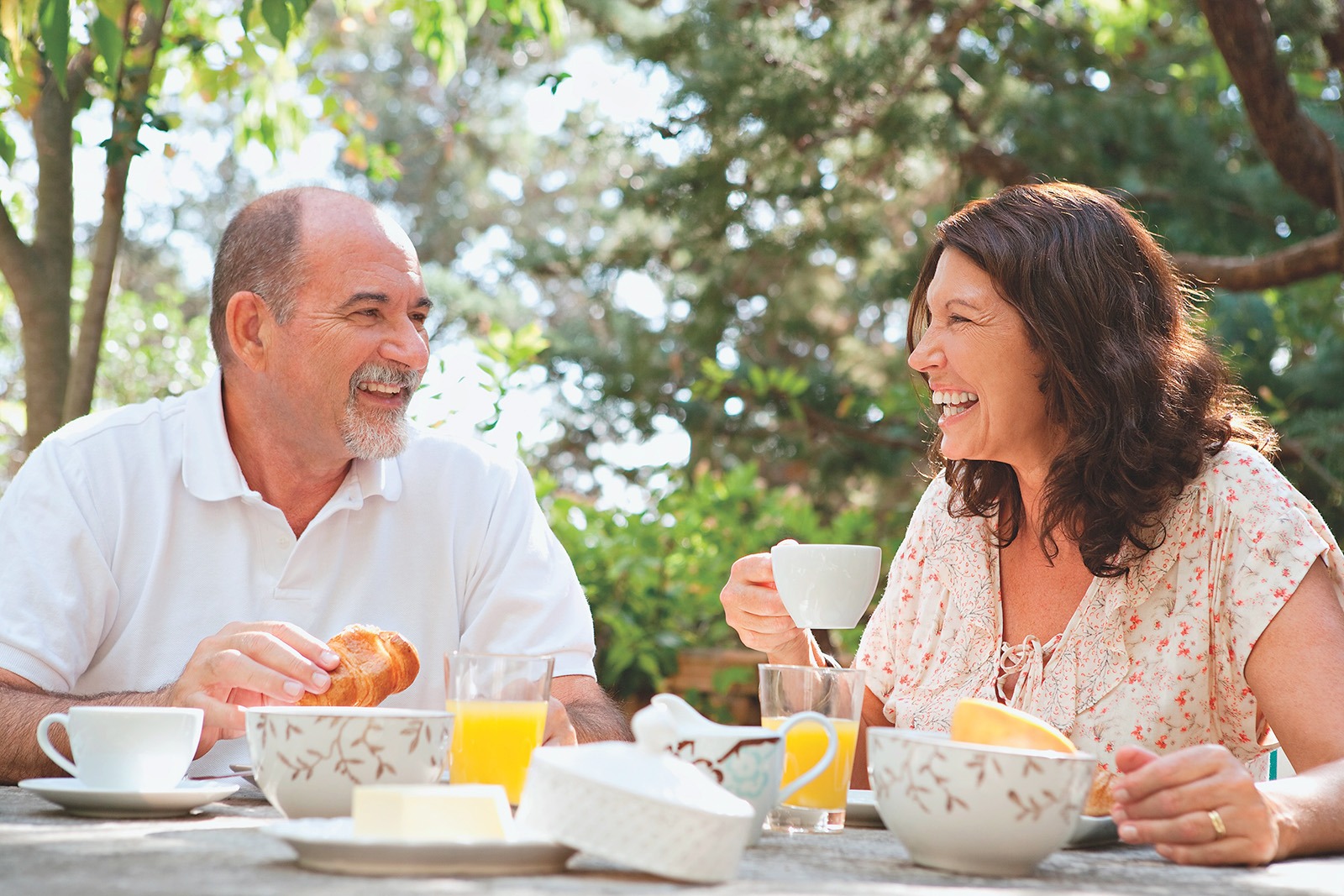 An older couple eating a meal together