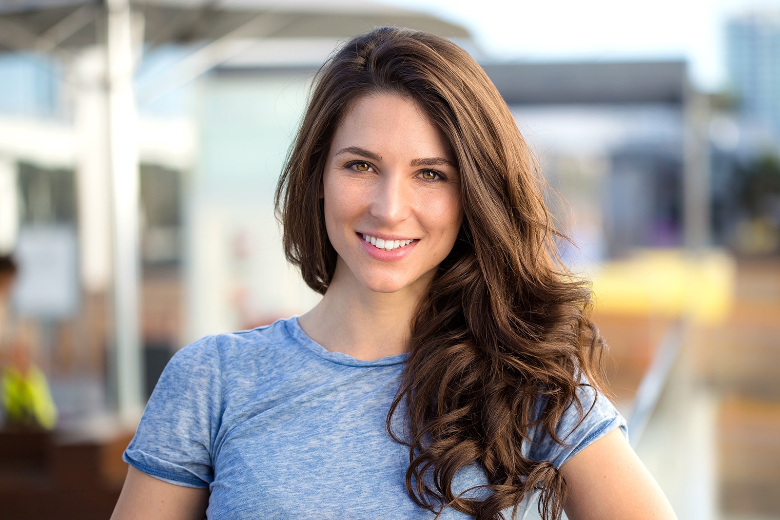 A smiling woman outdoors